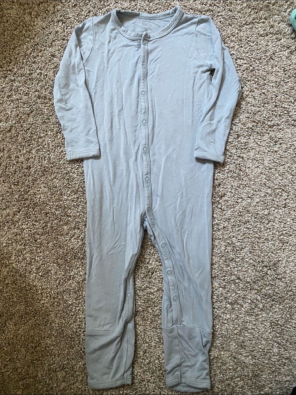 Kyte Baby unisex romper with a snap closure.